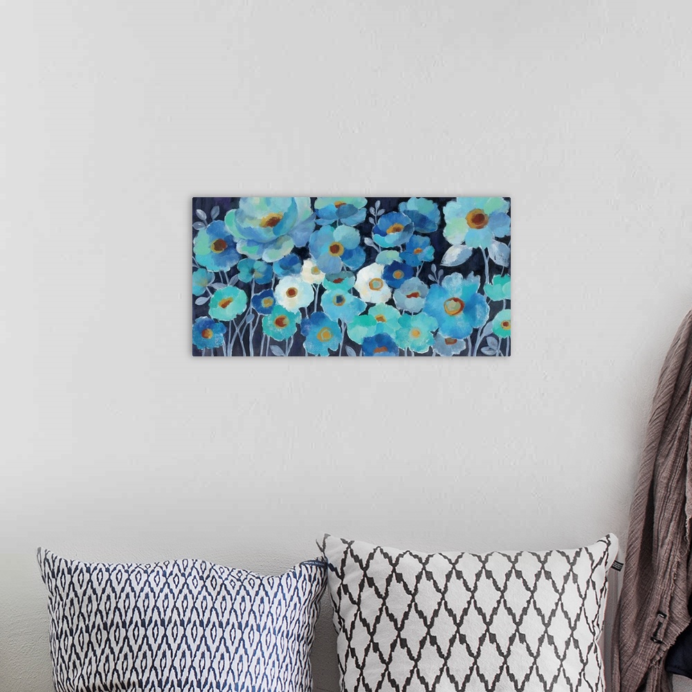 A bohemian room featuring Contemporary painting of various blue toned flowers together.