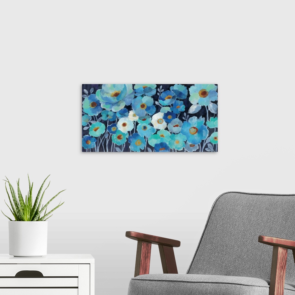 A modern room featuring Contemporary painting of various blue toned flowers together.