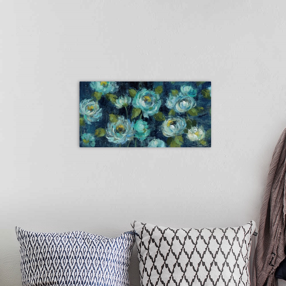 A bohemian room featuring Contemporary artwork of bright blue flowers against a navy blue background.