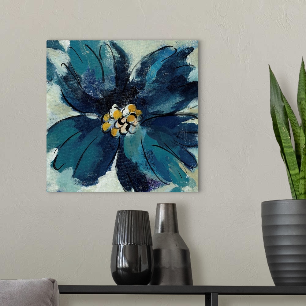 A modern room featuring Square painting of a single blue flower with a gold pistil.