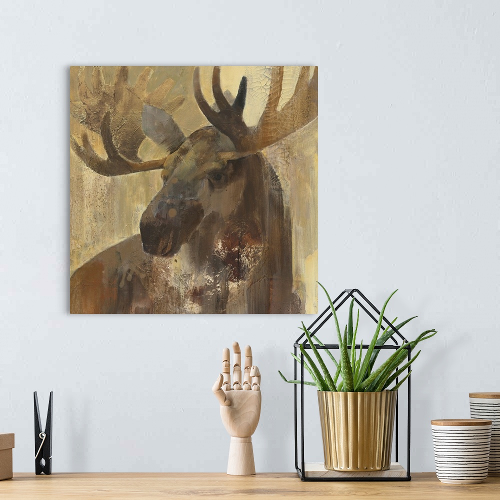 A bohemian room featuring Contemporary wildlife painting of a moose staring at viewer.