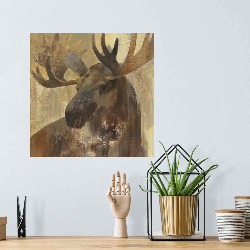 A bohemian room featuring Contemporary wildlife painting of a moose staring at viewer.
