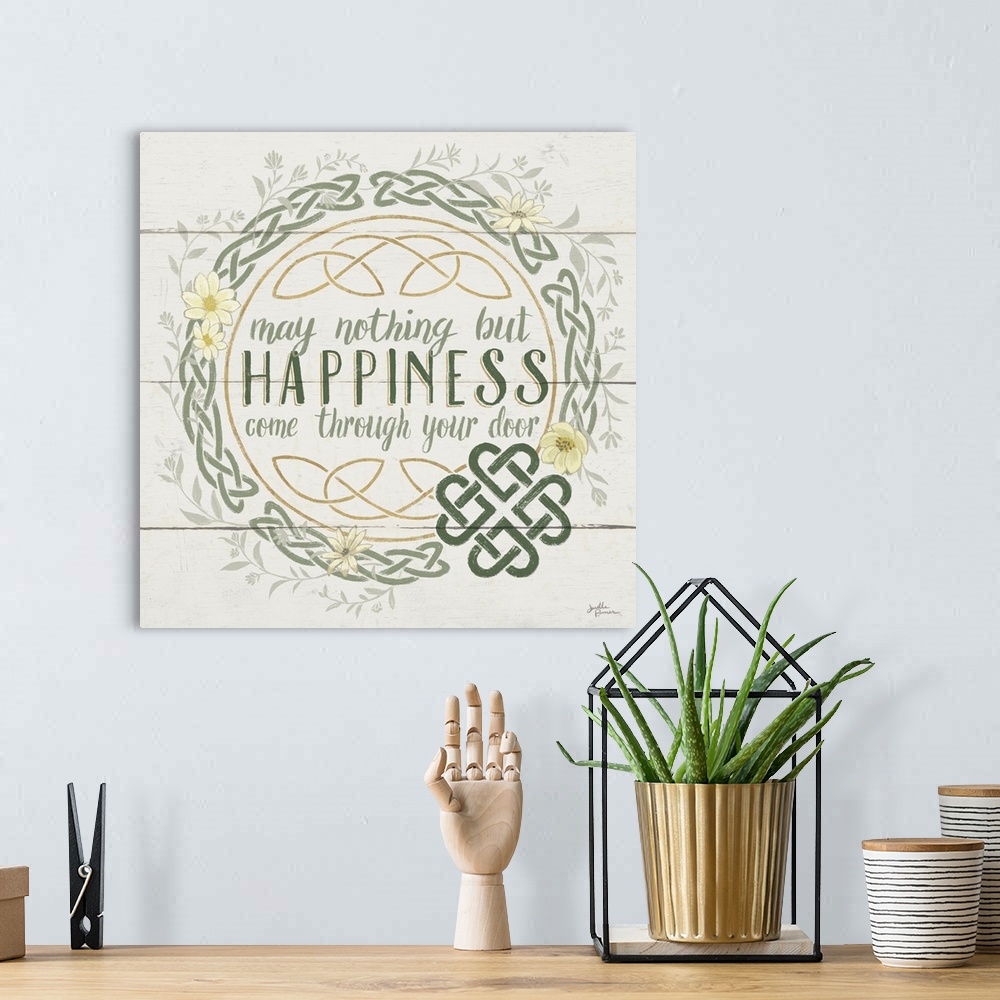 A bohemian room featuring "May Nothing But Happiness Come Through Your Door" inside a Celtic knot wreath, on a wood paneled...