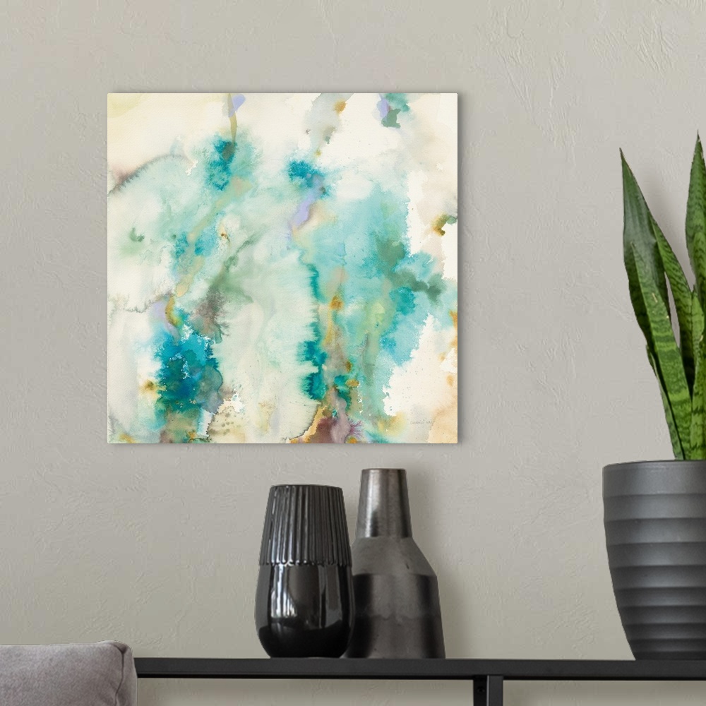 A modern room featuring Contemporary artwork featuring blue watercolor bleeds with neutral colors.