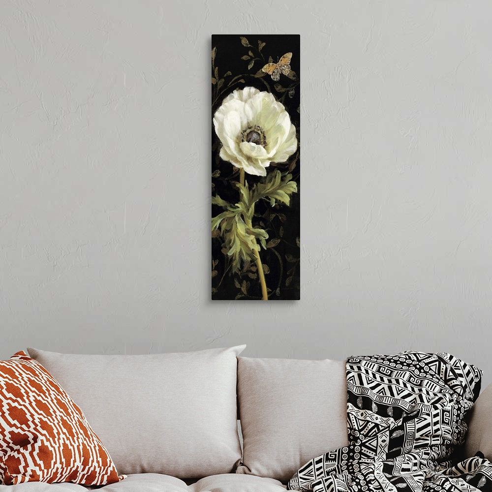 A bohemian room featuring Contemporary painting of a flower close-up in the frame of the image.