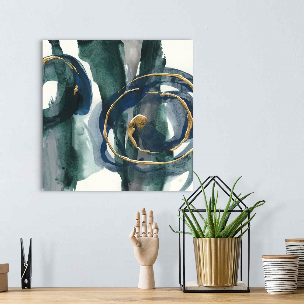 A bohemian room featuring Large abstract painting with dark teal and blue paint on a white background, and metallic gold sw...