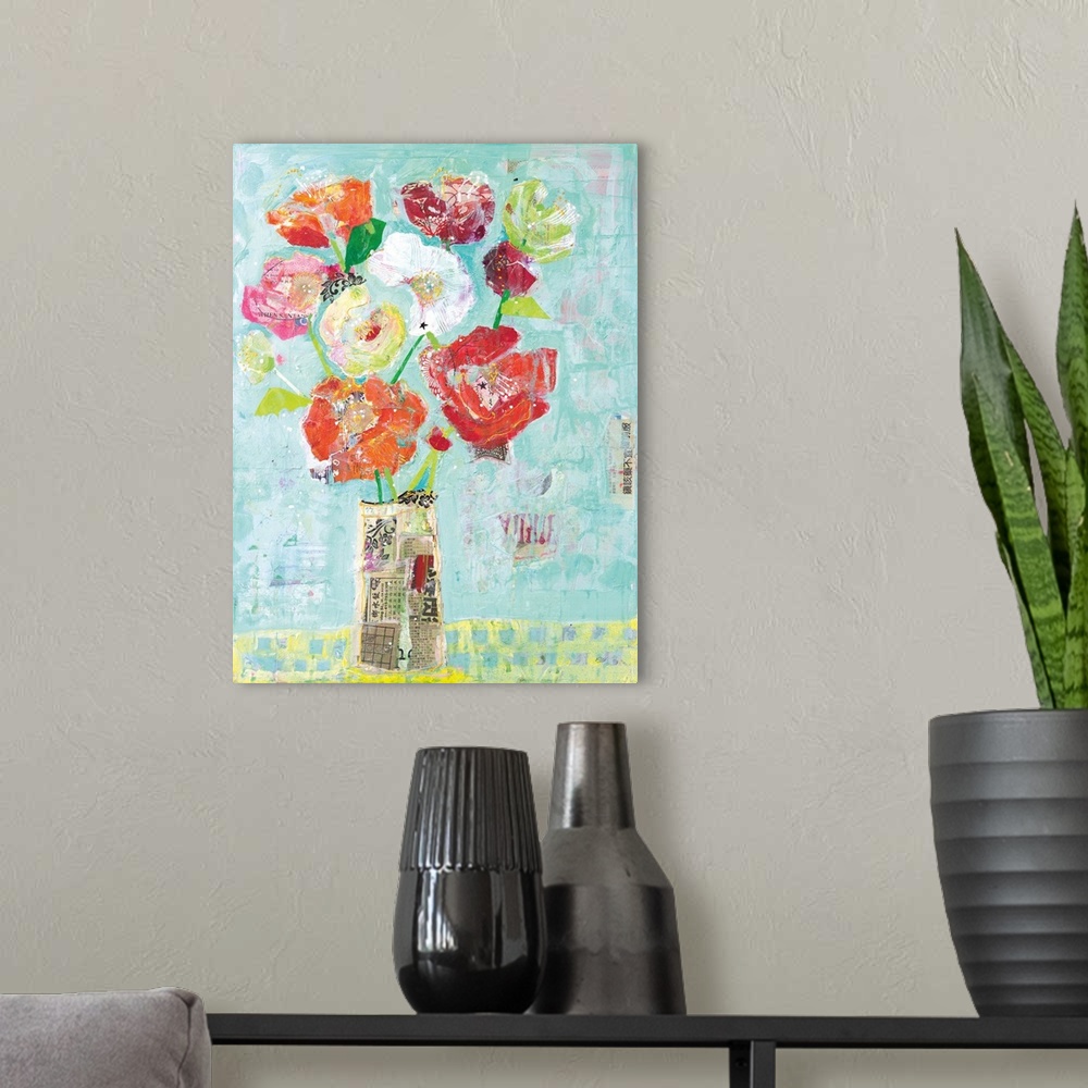A modern room featuring Mixed media artwork creating colorful flowers in a vase made out of newspaper clippings on a ligh...