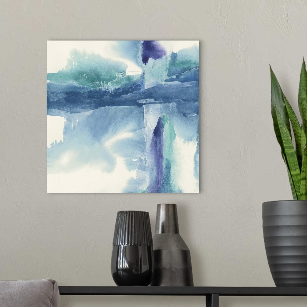 A modern room featuring Abstract artwork using cool blue and purple tones against a white background.