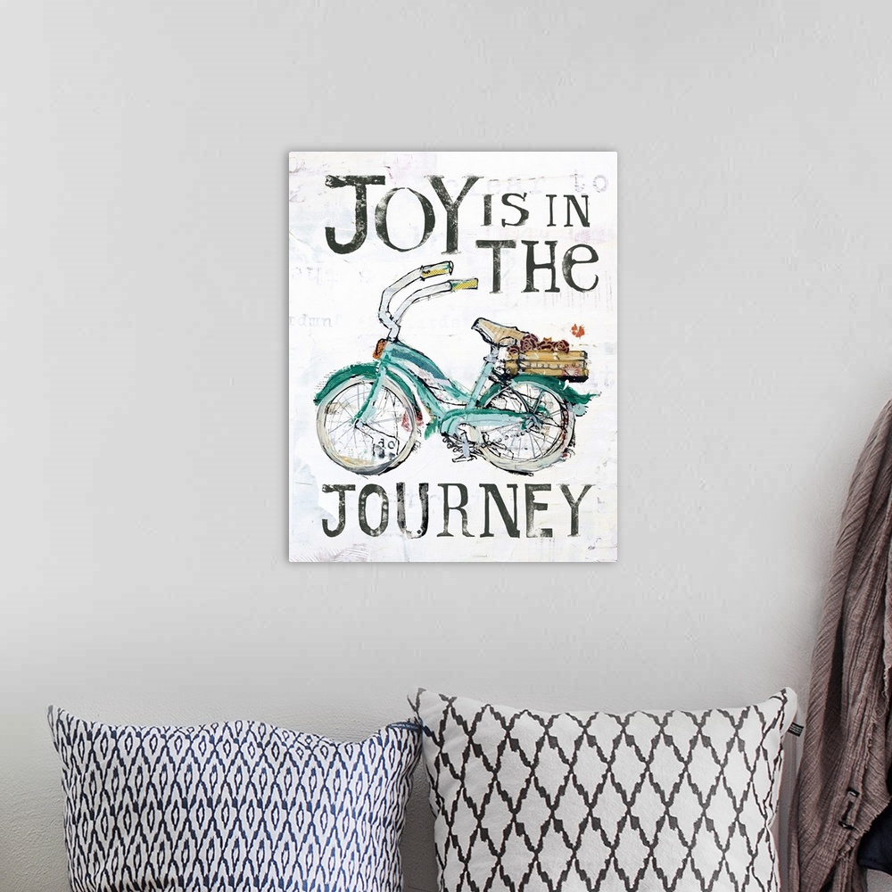 A bohemian room featuring "Joy is in the Journey" with a green bicycle, created with mixed media