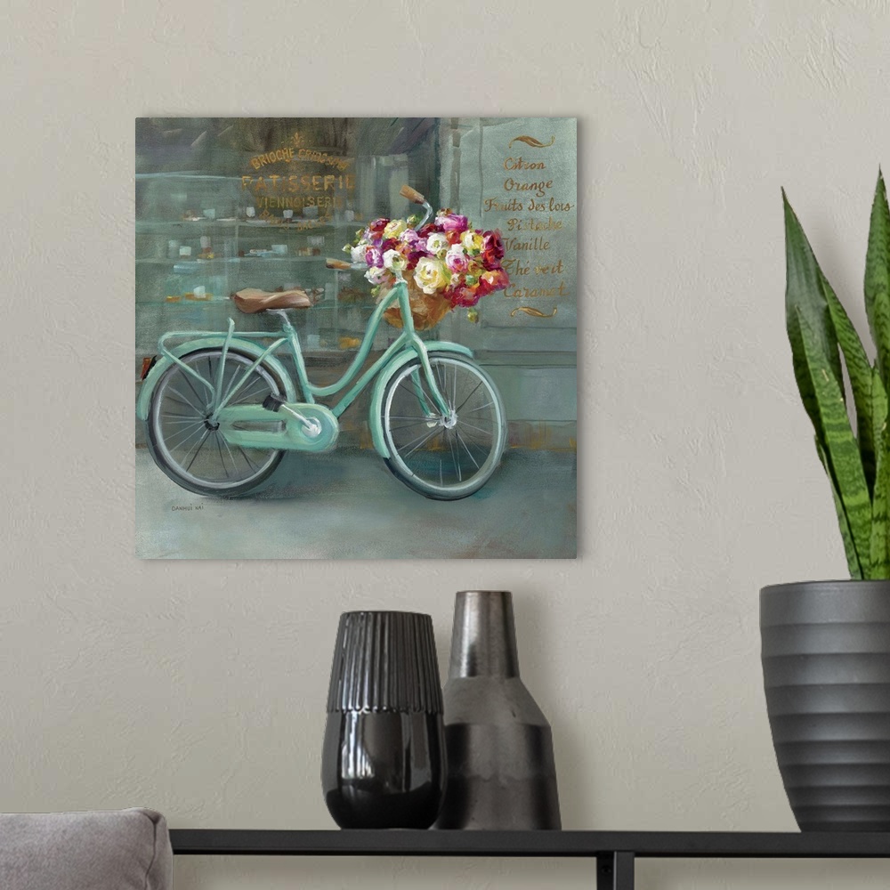 A modern room featuring Contemporary artwork of a bicycle with flowers in the handlebar basket.