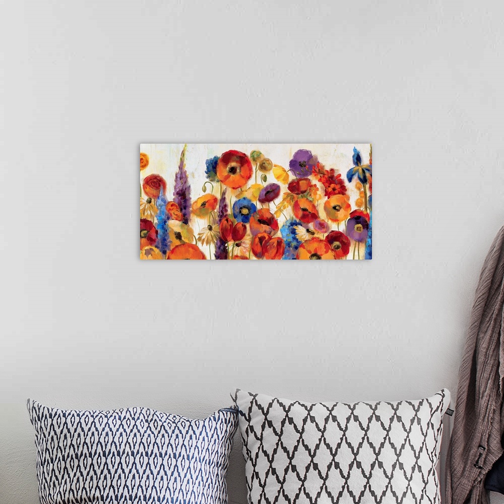 A bohemian room featuring A large canvas still life of a variety of vividly colored flowers for home art docor.