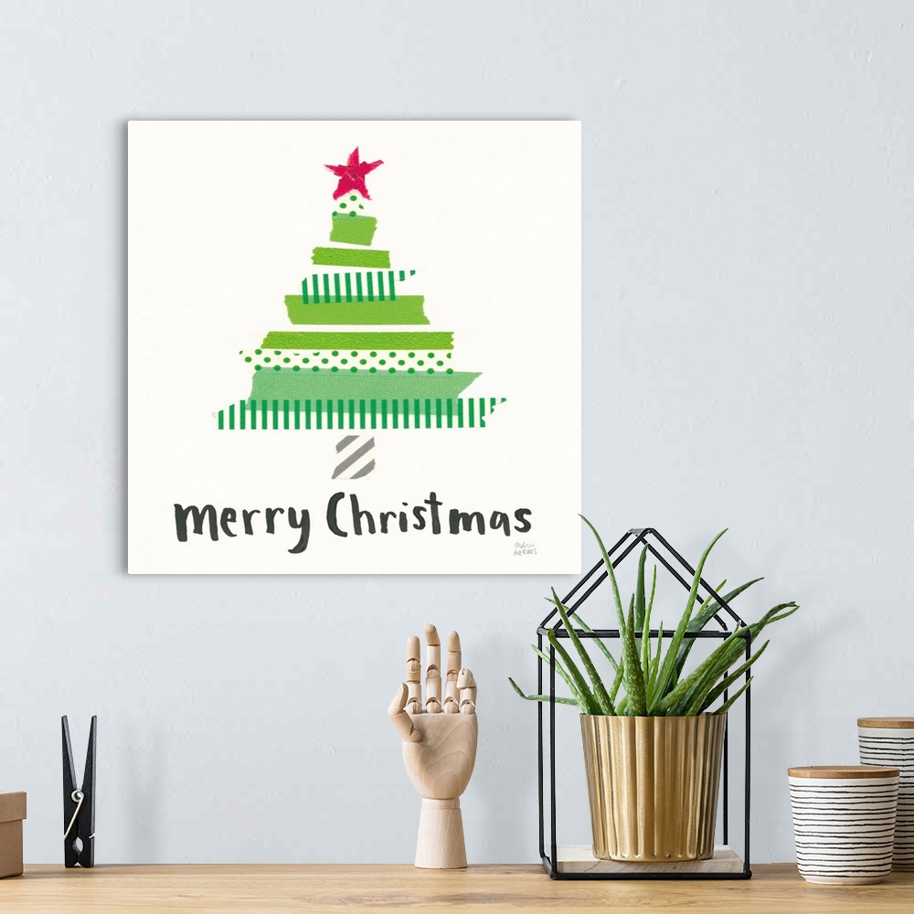 A bohemian room featuring Mixed media art with a Christmas tree and 'Merry Christmas' written in black below on a white squ...