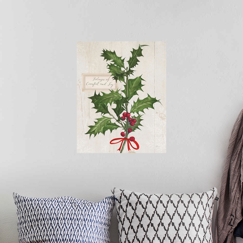A bohemian room featuring Decorative artwork of holly with the words "Tidings of Comfort and Joy" on a white wood background.