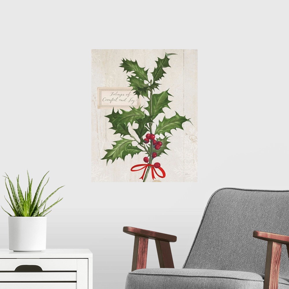 A modern room featuring Decorative artwork of holly with the words "Tidings of Comfort and Joy" on a white wood background.