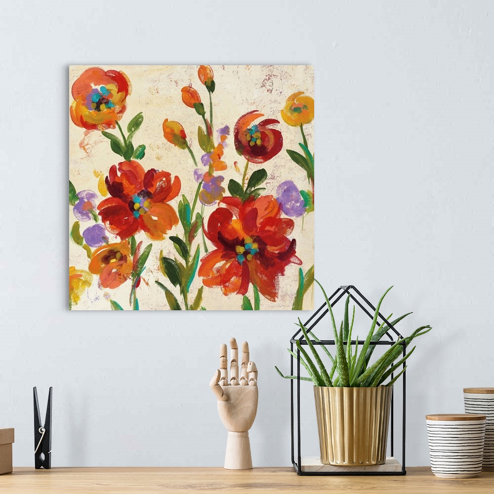 A bohemian room featuring Square contemporary painting of colorful red and orange flowers on a beige and cream colored back...
