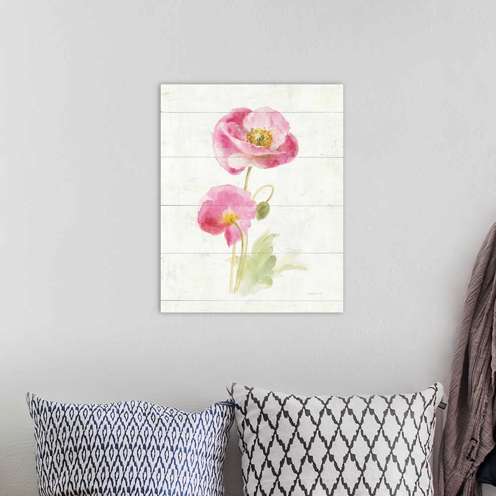 A bohemian room featuring Contemporary artwork of a pink blooming poppy on a cream colored wood background.