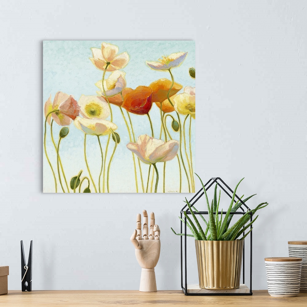 A bohemian room featuring Painting of several flowers in different colors, some in bloom, with a few buds, against a pale b...