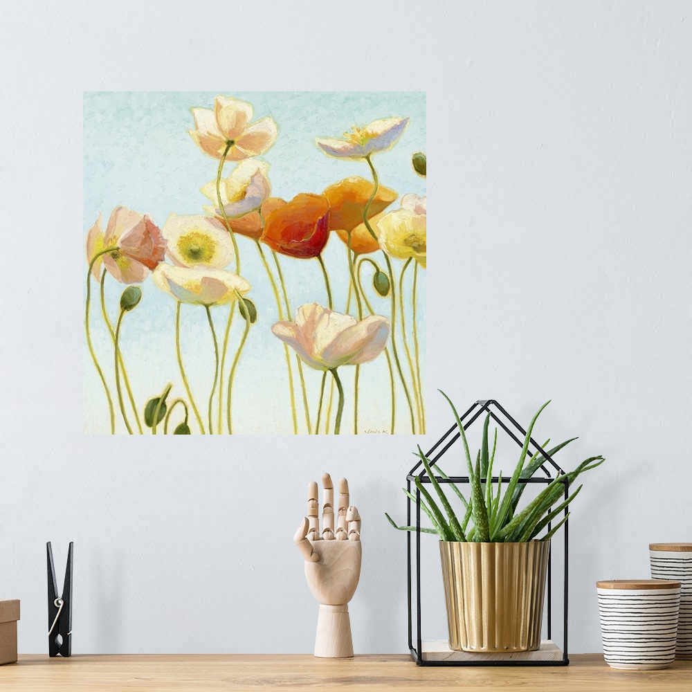 A bohemian room featuring Painting of several flowers in different colors, some in bloom, with a few buds, against a pale b...