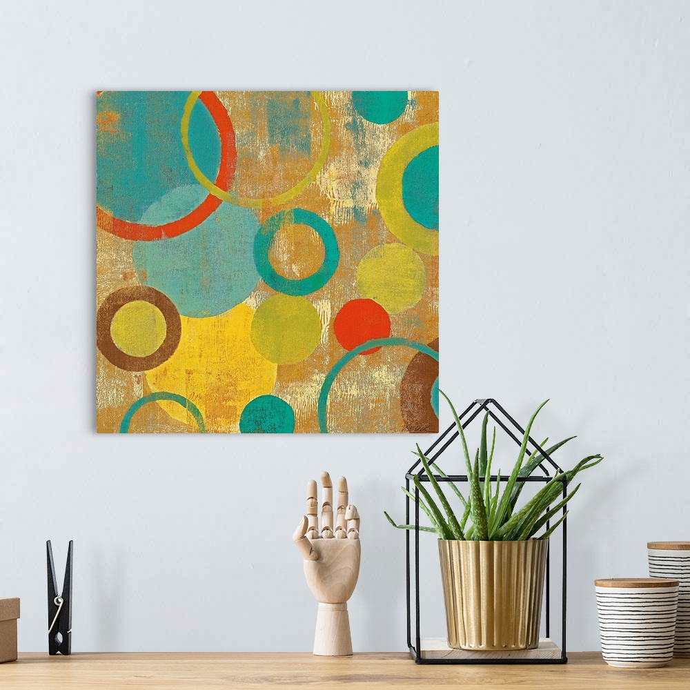 A bohemian room featuring Contemporary painting of overlapping circles and loops varying in color and size on an abstract b...