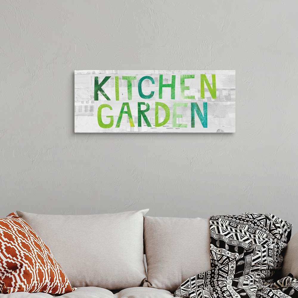 A bohemian room featuring "Kitchen Garden" in various green tones on a gray wood plank backdrop.