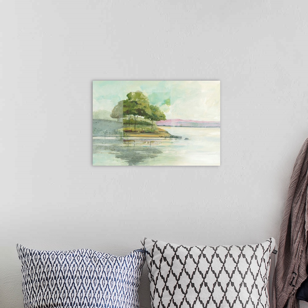 A bohemian room featuring Watercolor landscape painting of trees at the edge of a lake.