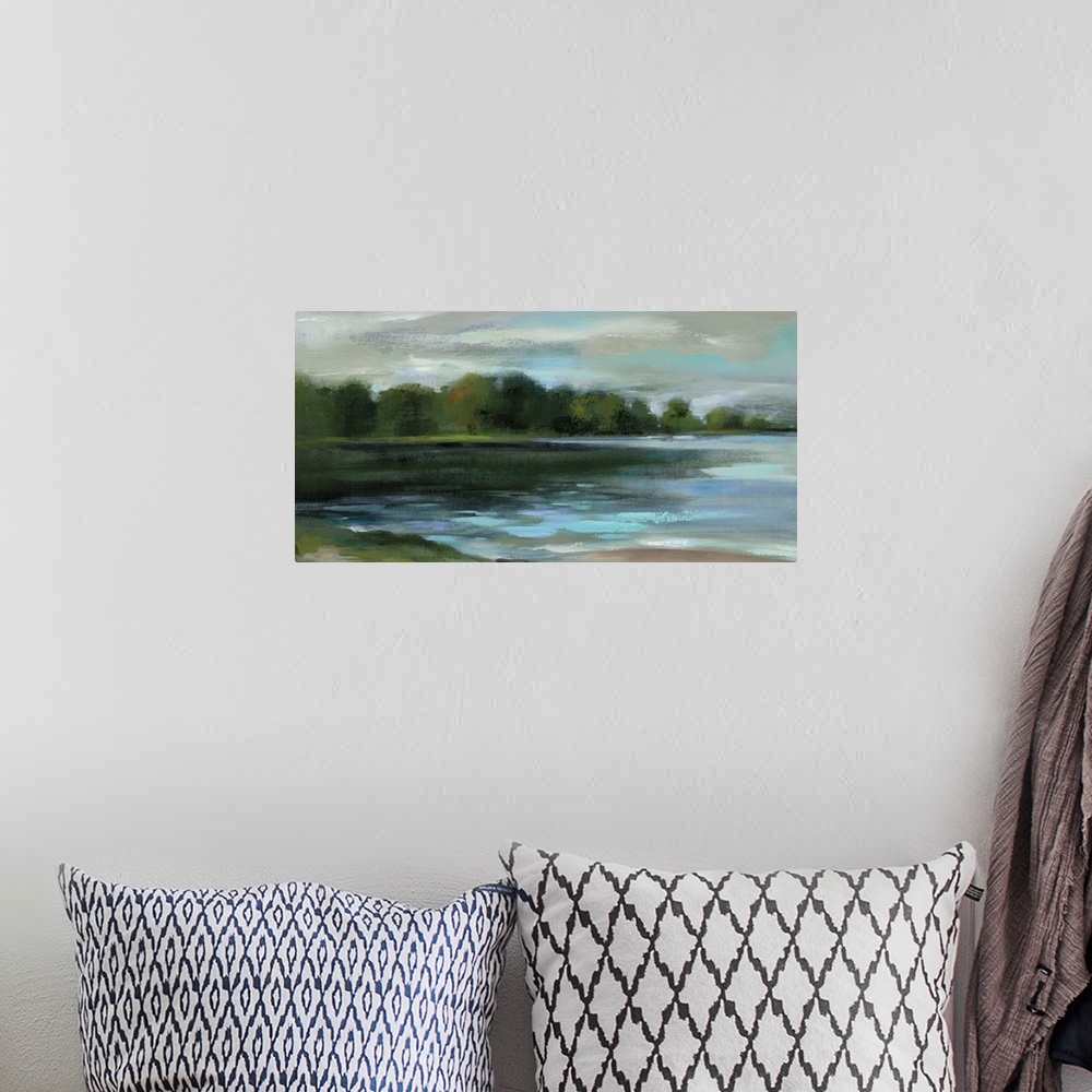 A bohemian room featuring Contemporary landscape painting of a lakeside lined with trees.