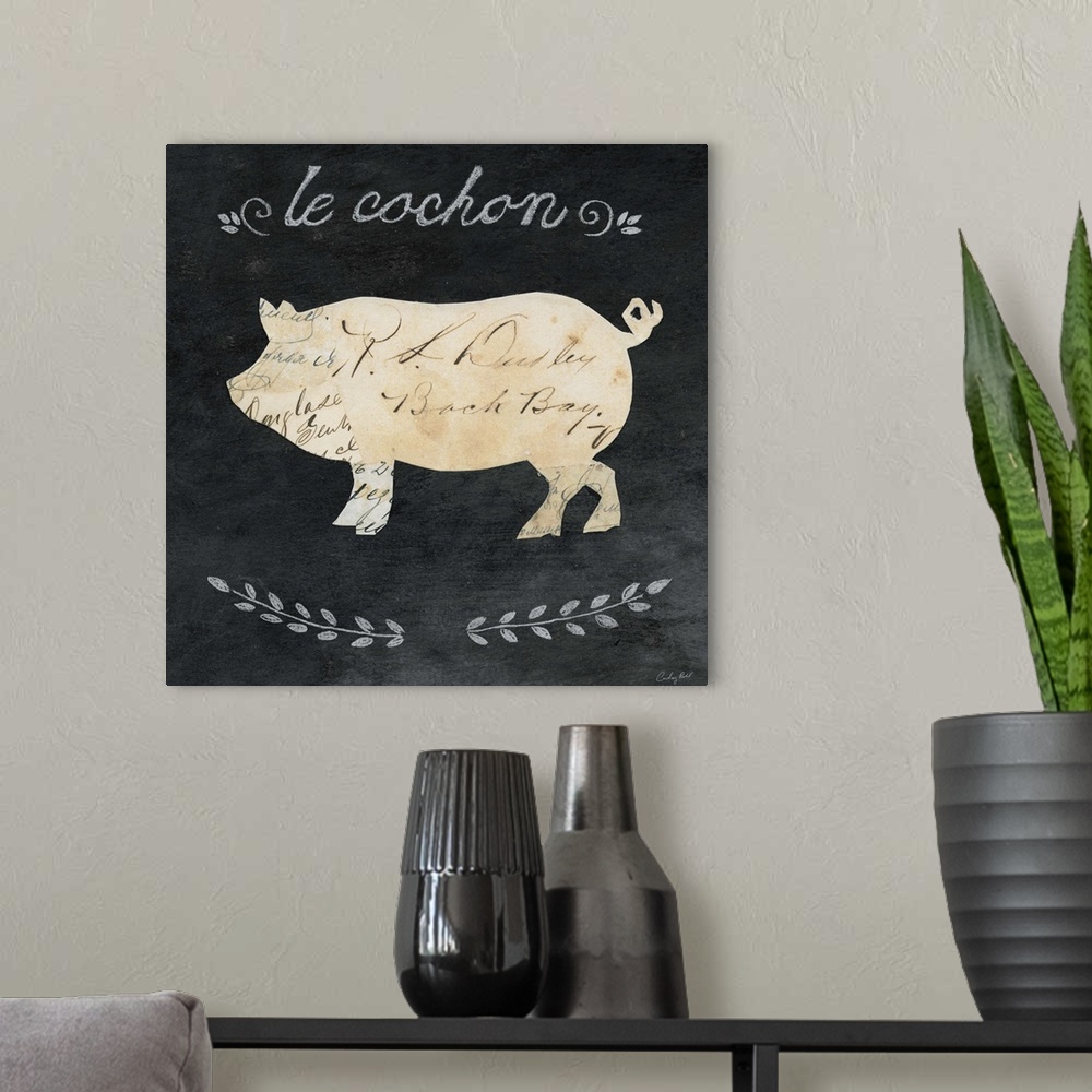 A modern room featuring Artwork of a pig cameo against a chalkboard background.
