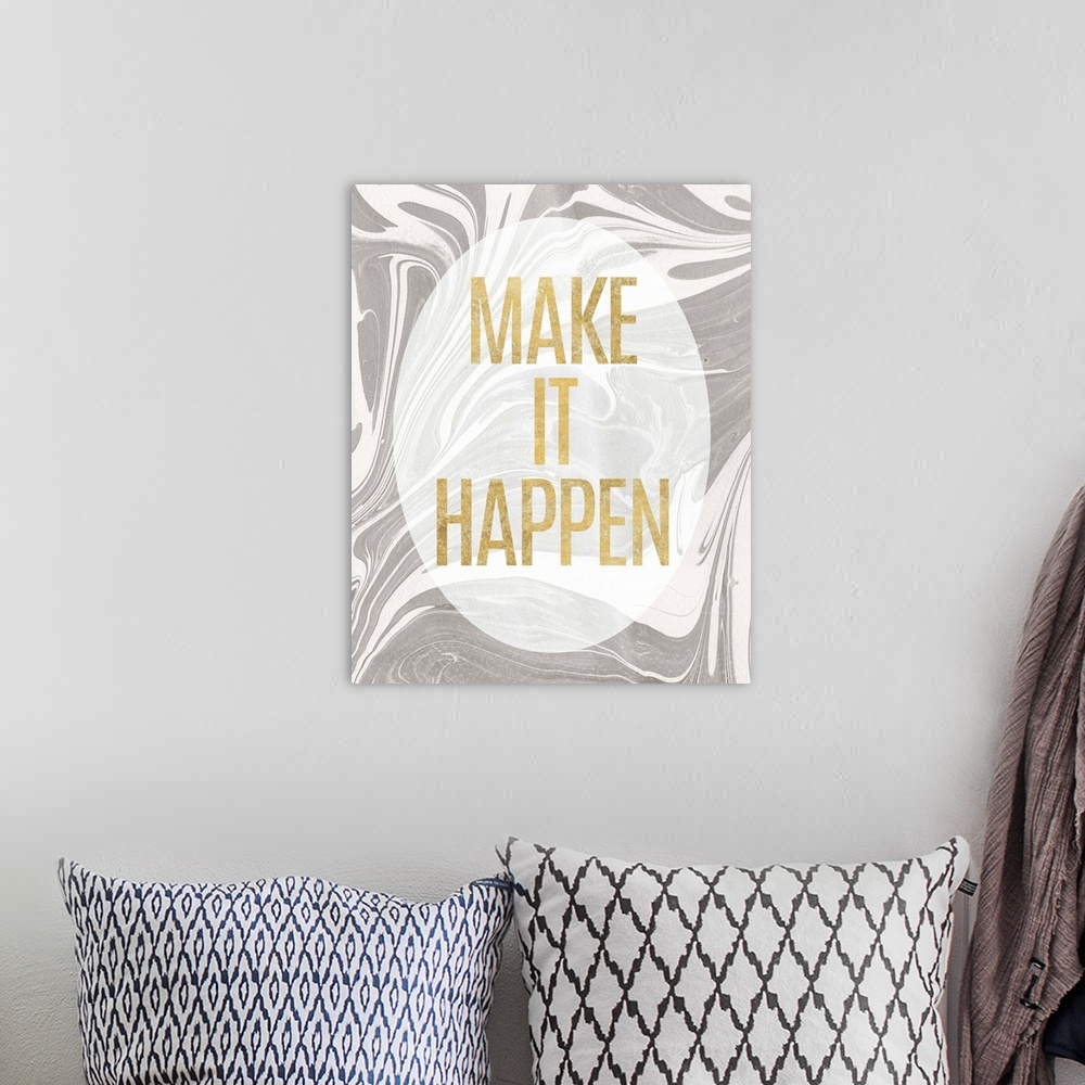 A bohemian room featuring "Make It Happen" written in gold inside a white translucent oval on a gray and white marbled back...