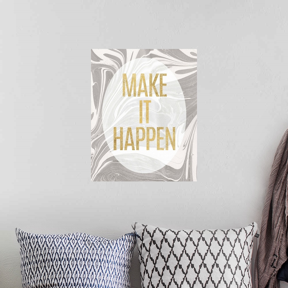 A bohemian room featuring "Make It Happen" written in gold inside a white translucent oval on a gray and white marbled back...