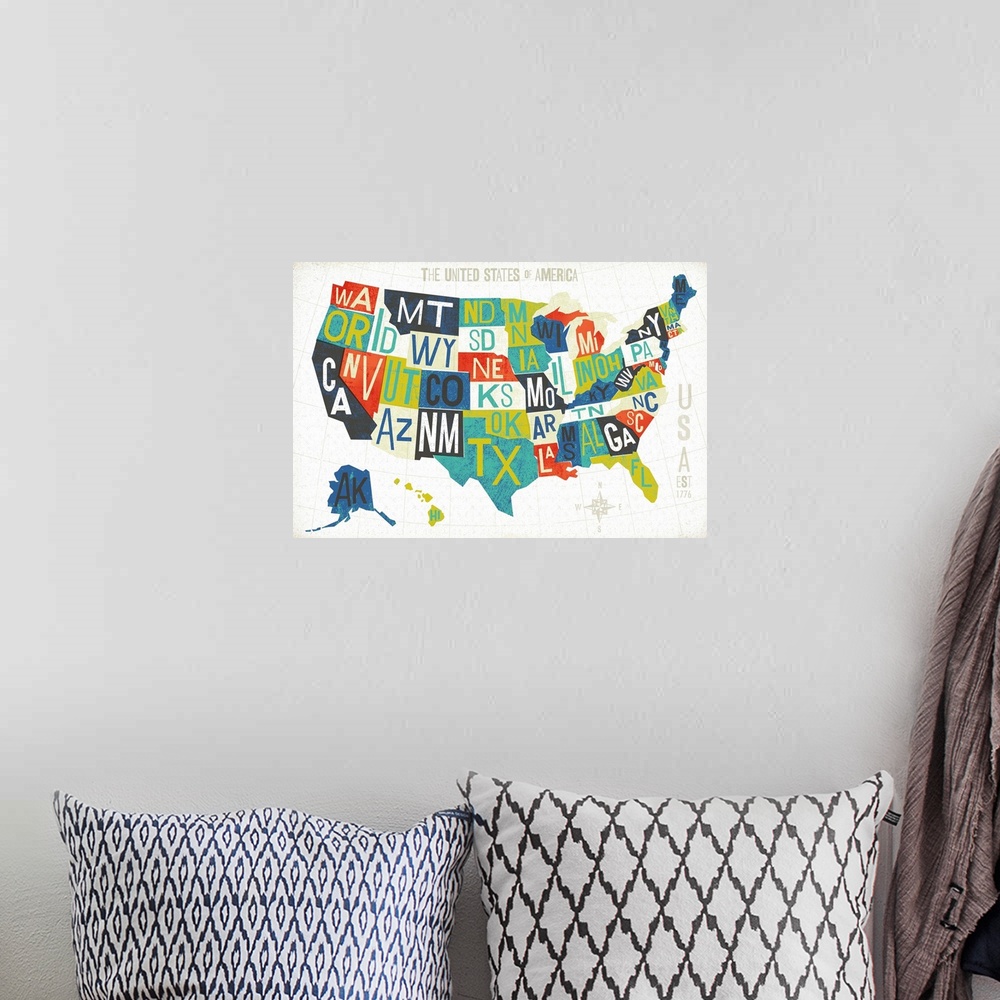 A bohemian room featuring Map of the United States of America with the abbreviation of each state.
