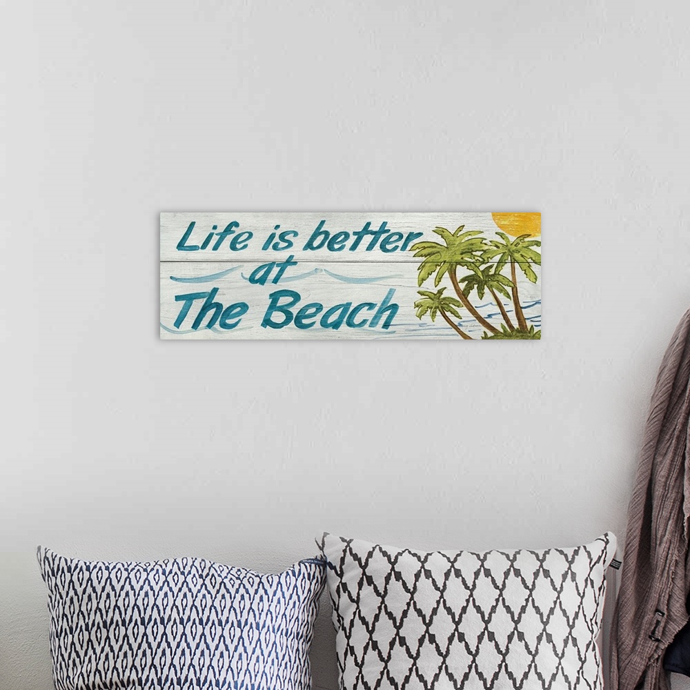 A bohemian room featuring Life is Better at the Beach