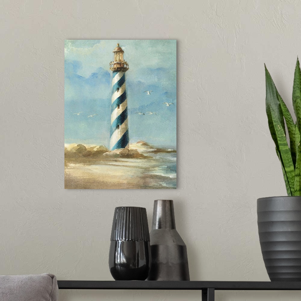 A modern room featuring Contemporary painting of a blue spiral striped lighthouse in a coastal scene.