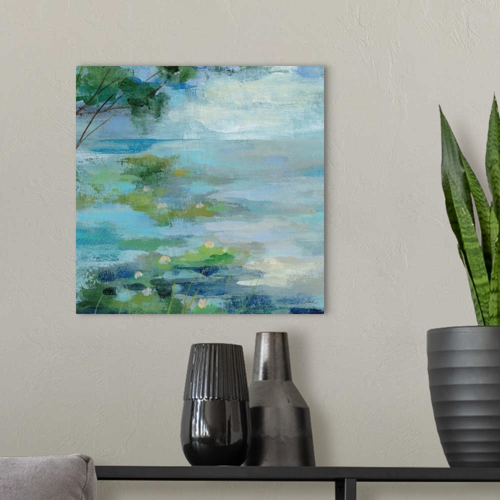 A modern room featuring Contemporary painting of green lilypads in a calm blue pond.