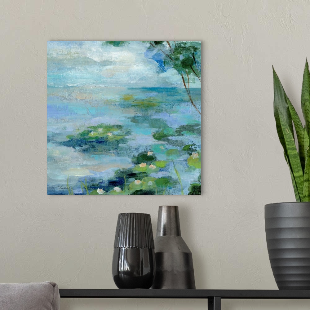 A modern room featuring Contemporary painting of green lilypads in a calm blue pond.