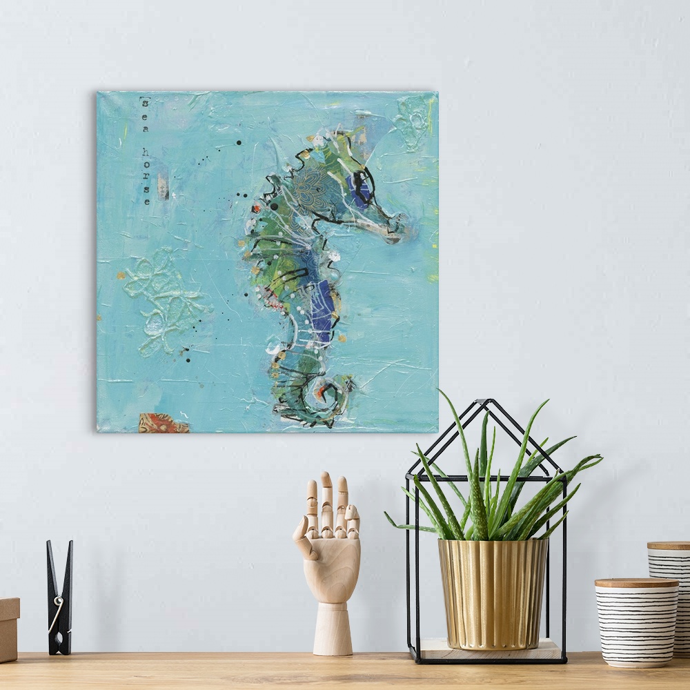 A bohemian room featuring Square abstract painting of a seahorse with a light blue textured background and the word "Seahor...