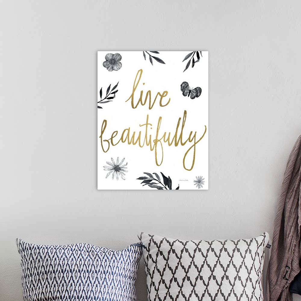 A bohemian room featuring Gold handlettering against a white background with leaves and butterfly.