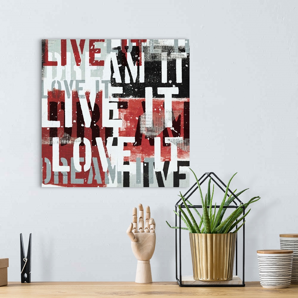 A bohemian room featuring Contemporary artwork of different words in a stencil style overlapping each other, covering the e...