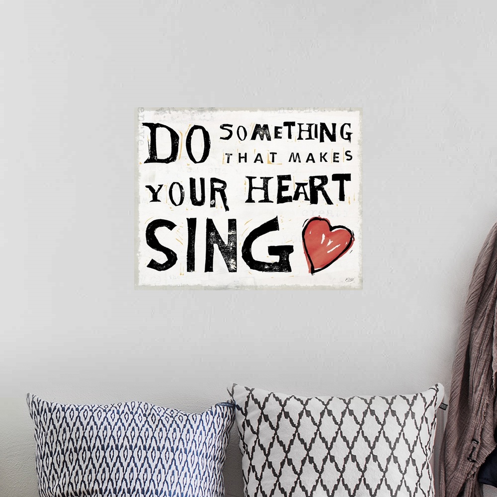 A bohemian room featuring Inspirational art with the quote "Do Something That Makes Your Heart Sing" written in black and w...