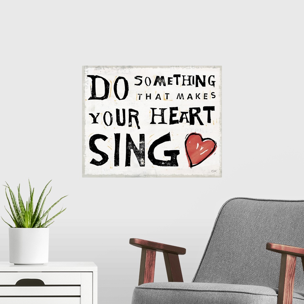 A modern room featuring Inspirational art with the quote "Do Something That Makes Your Heart Sing" written in black and w...