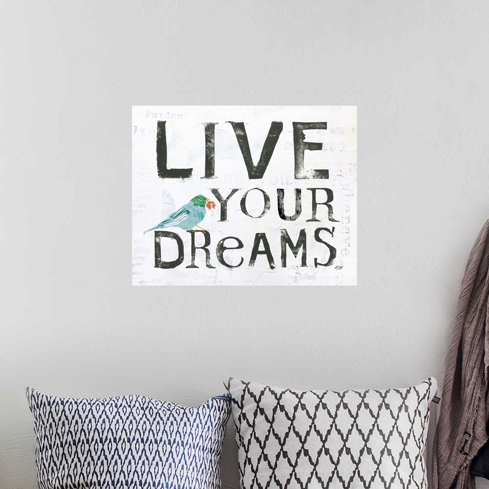 A bohemian room featuring "Live Your Dreams" with a bird and faint text on the background, created with mixed media.