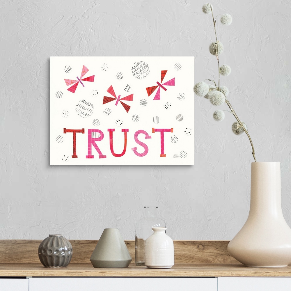A farmhouse room featuring Mixed media artwork with the word "Trust," cut out dragonflies, and circles with black designs on...