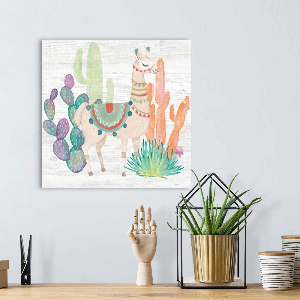 A bohemian room featuring Decorative artwork of an illustrated llama surrounded by brightly color cacti.