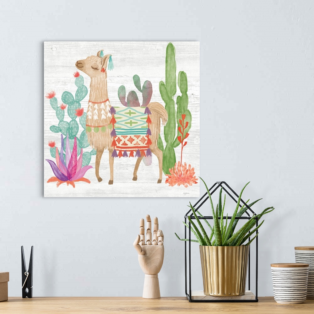 A bohemian room featuring Decorative artwork of an illustrated llama surrounded by brightly color cacti.
