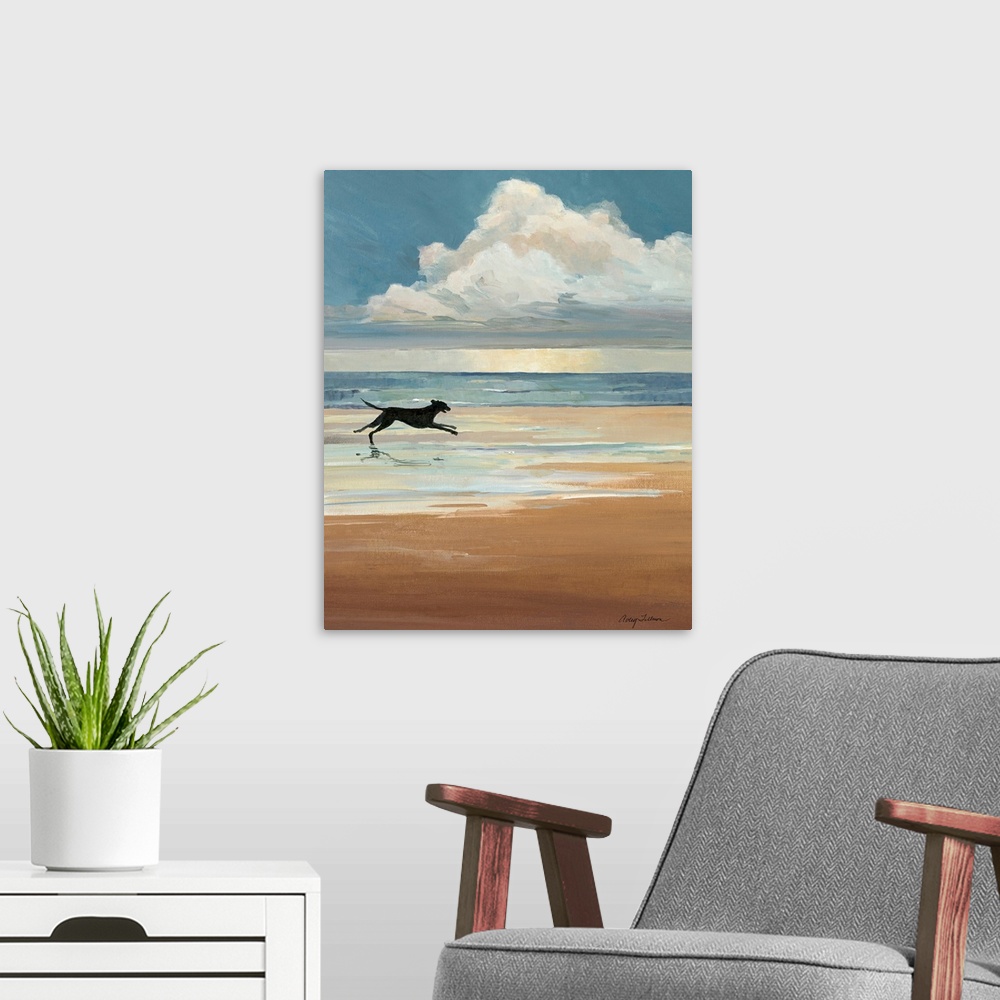 A modern room featuring A black Labrador runs on a sandy beach with a large cloud on the ocean horizon in this vertical l...