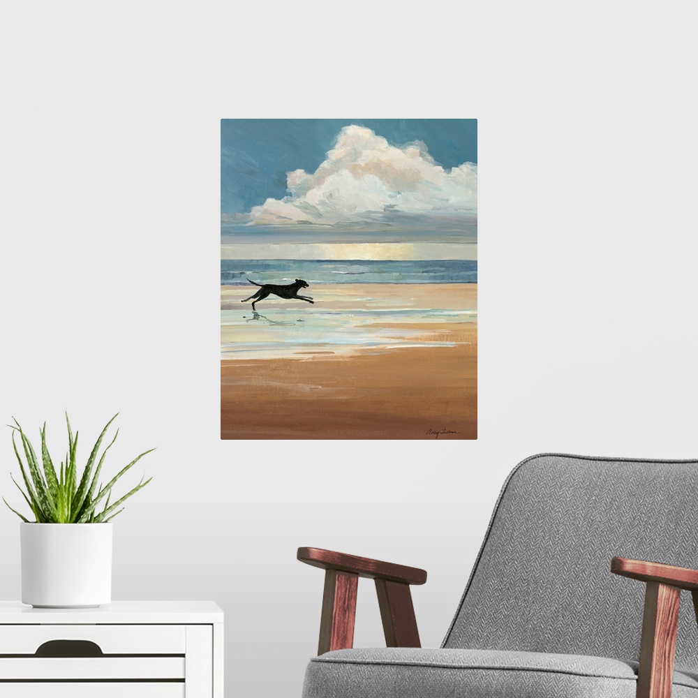 A modern room featuring A black Labrador runs on a sandy beach with a large cloud on the ocean horizon in this vertical l...