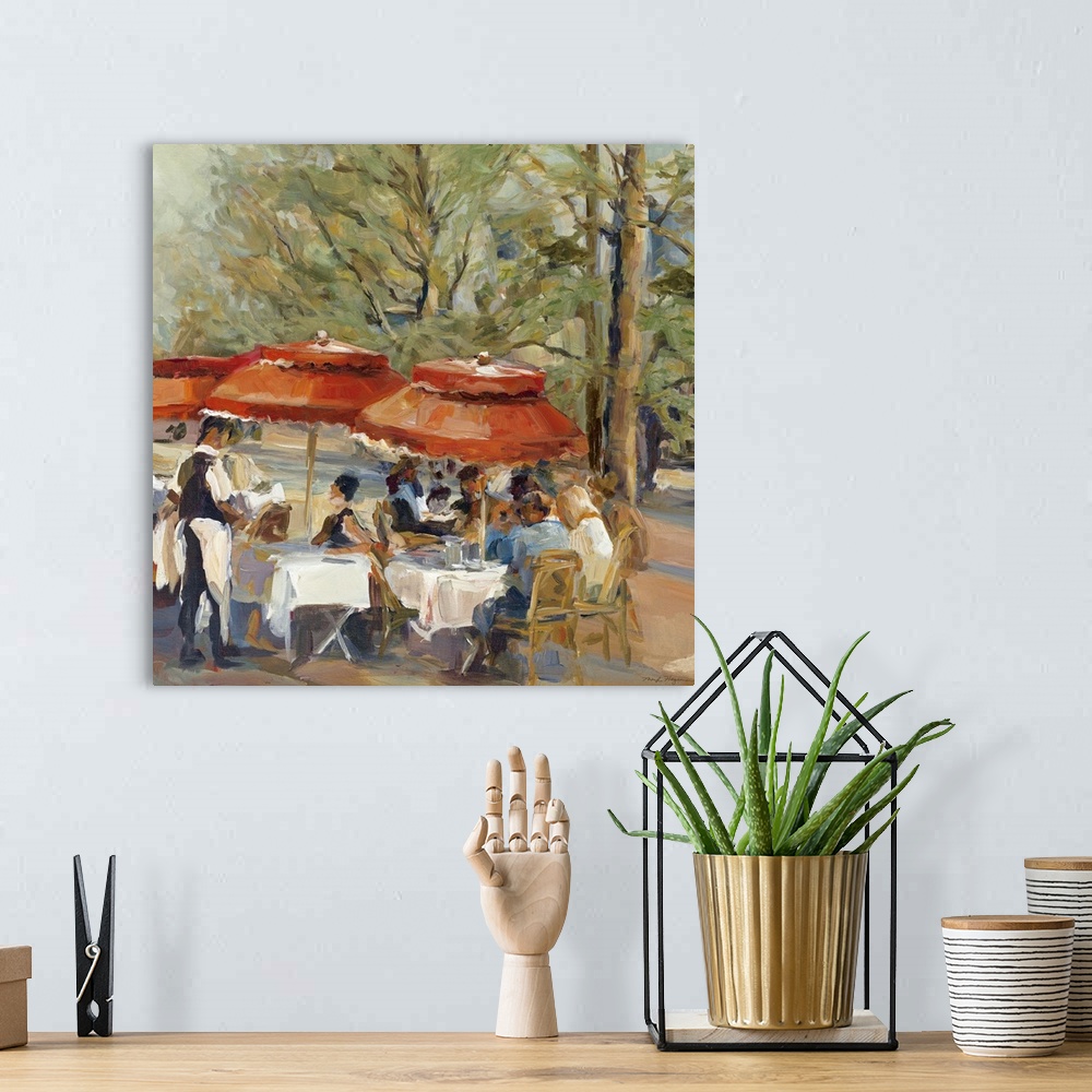 A bohemian room featuring This square decorative wall art is a square painting of tourist at an outdoor Parsian cafo under ...