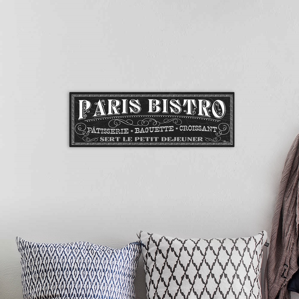 A bohemian room featuring Giant horizontal wall hanging of decorative text, reading "Paris Bistro", surrounded by swirling ...