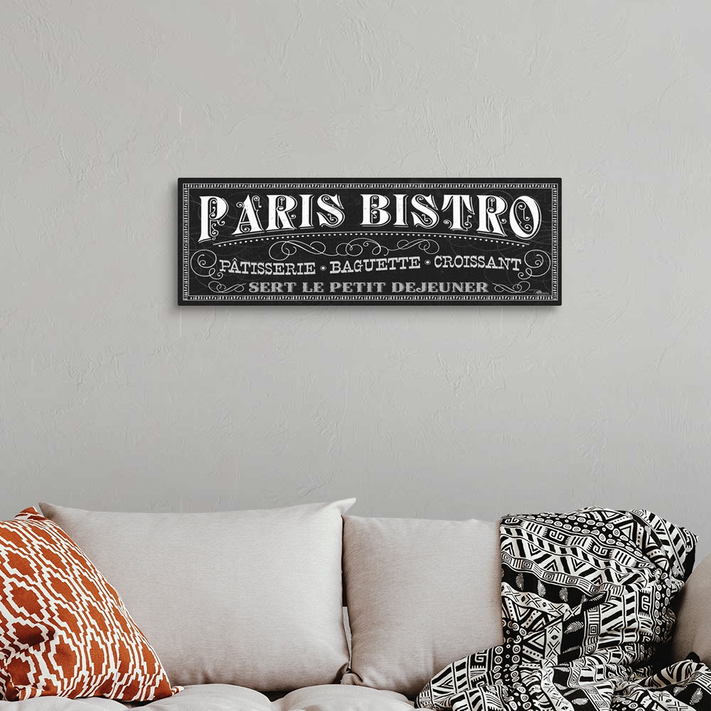 A bohemian room featuring Giant horizontal wall hanging of decorative text, reading "Paris Bistro", surrounded by swirling ...