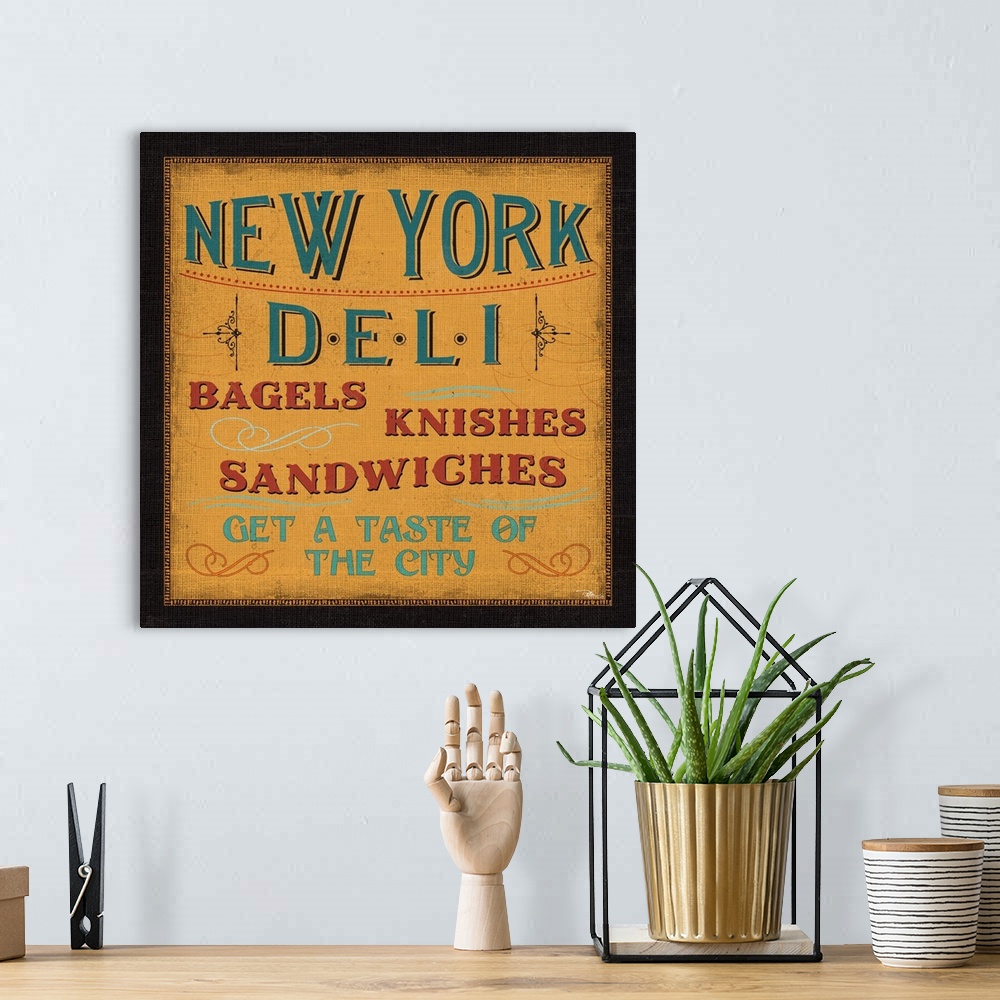 A bohemian room featuring A vintage-style sign for a New York deli, advertising bagels, knishes, and sandwiches.