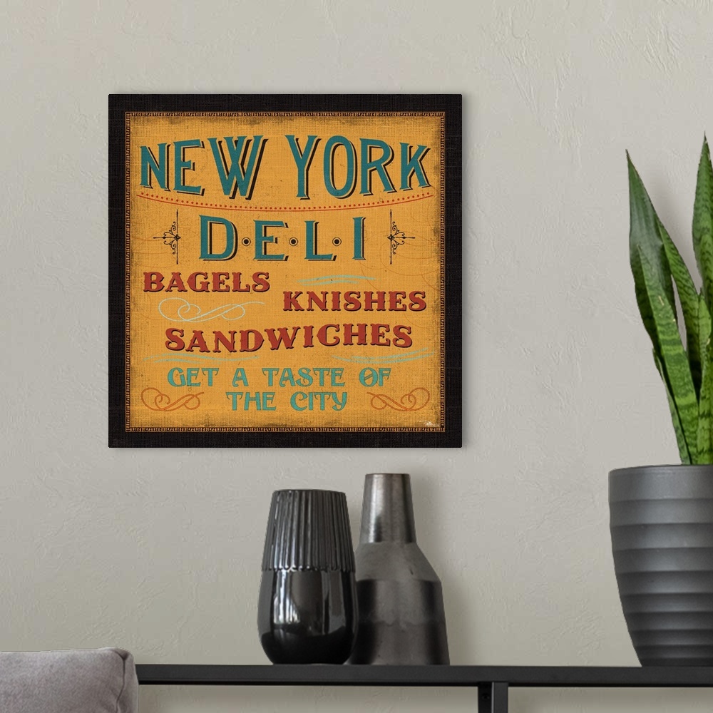 A modern room featuring A vintage-style sign for a New York deli, advertising bagels, knishes, and sandwiches.